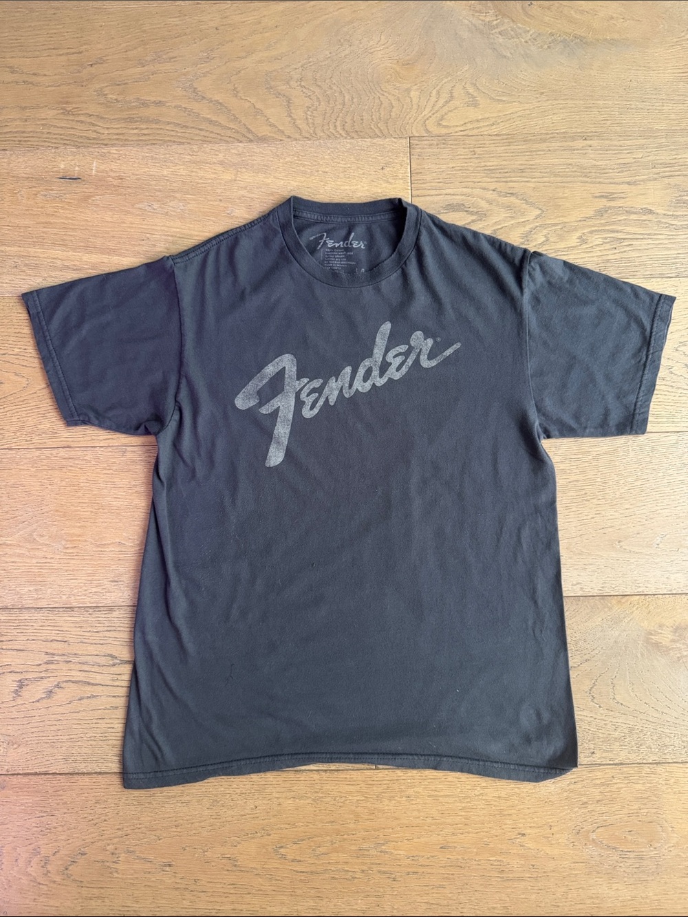 Fender t-shirt charcoal gray weathered script logo across the chest